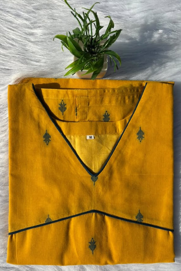 LSV 522 [ Mustard gold meets deep green whispers. Delicate leaf motifs scattered across pure elegance,framed by a sharp v - neck and subtle empire piping