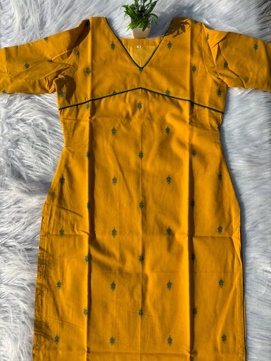 LSV 522 [ Mustard gold meets deep  green whispers. Delicate leaf motifs scattered across pure elegance,framed by a sharp v - neck and subtle empire piping
